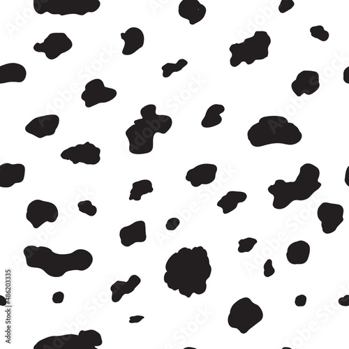 Dalmatian seamless pattern animal print . Black chaotic spots isolated on white.