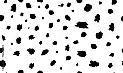 Dalmatian seamless pattern animal print . Black chaotic spots isolated on white.