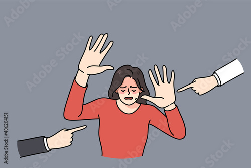 Unhappy crying woman feel stressed with people fingers pointing at her blaming. Upset sad girl depressed with bullying and harassment. Discrimination problem concept. Vector illustration. 