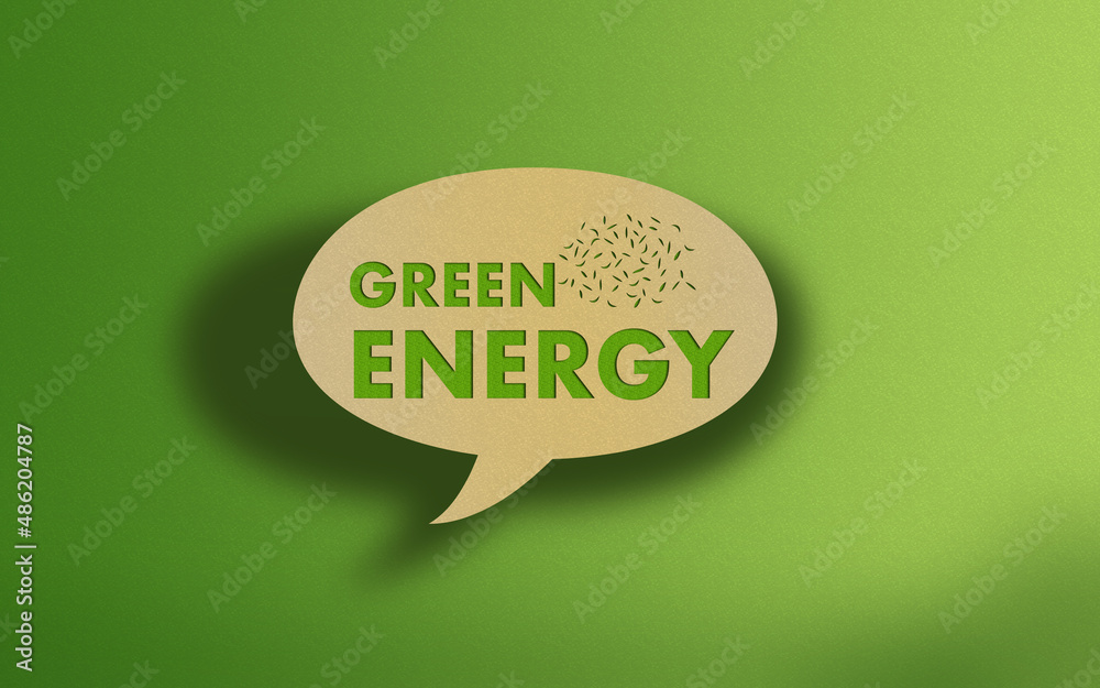 Green Energy Text on Recycled Craft Paper Againt Green Grass Background Green Energy Text on Recycled Craft Paper Againt Green Grass Background