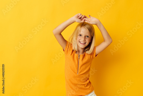 Young blonde girl smile hand gestures posing casual wear fun isolated background unaltered