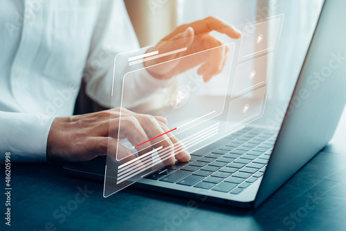 Businessman hands using laptop for streaming online, watching video on internet.