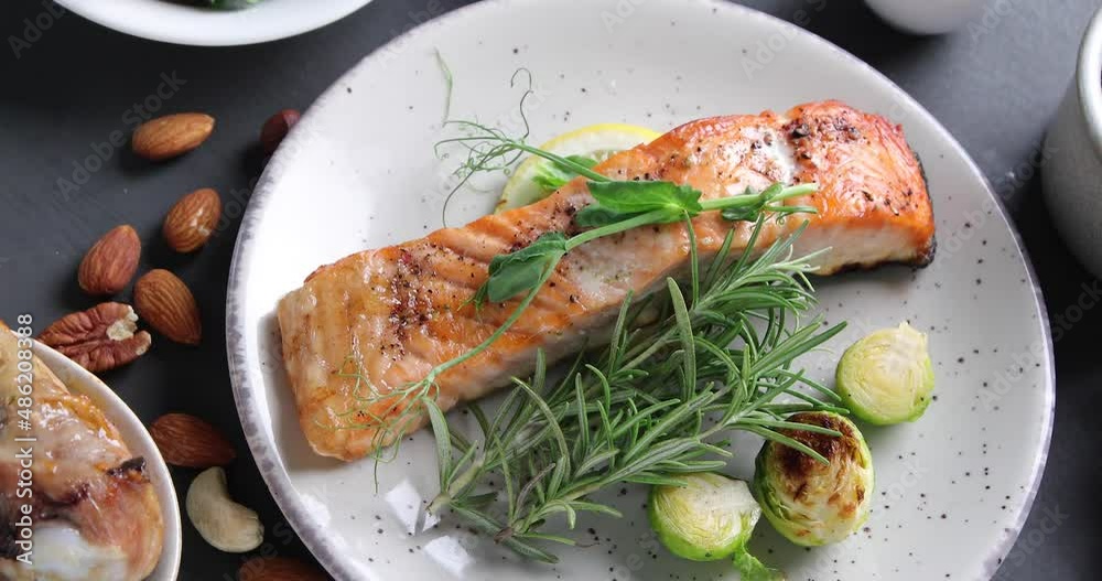 Roasted salmon with vegetables. Top view Roasted salmon with vegetables. Top view