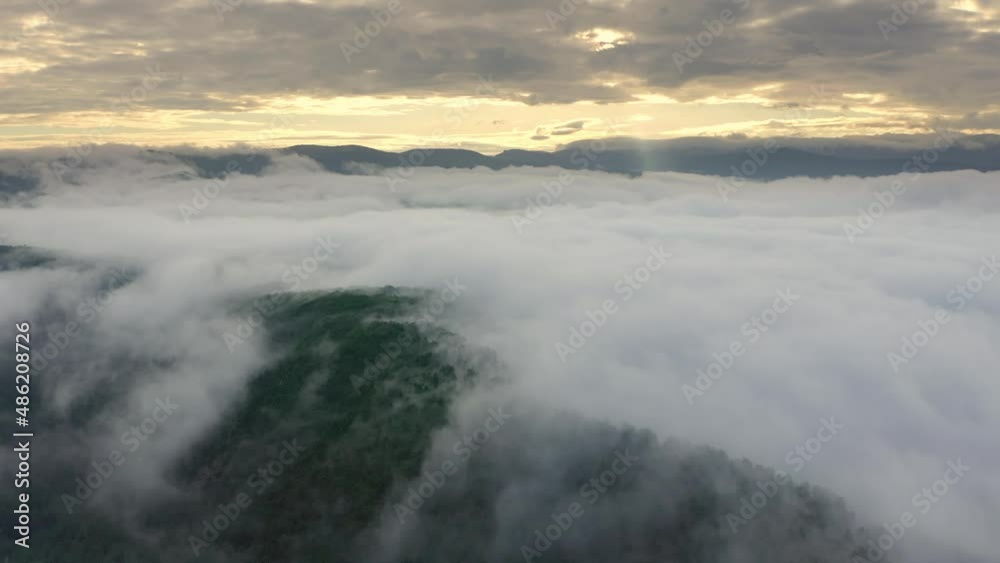 Aerial view white clouds in blue sky at morning. Top cloudscape view from drone. Aerial view white clouds in blue sky at morning. Top cloudscape view from drone.