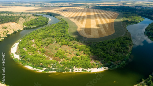 View from a height of the tract Krivoborye, Ramonsky district of the Voronezh region. Steep forested sandy slope of the Don River