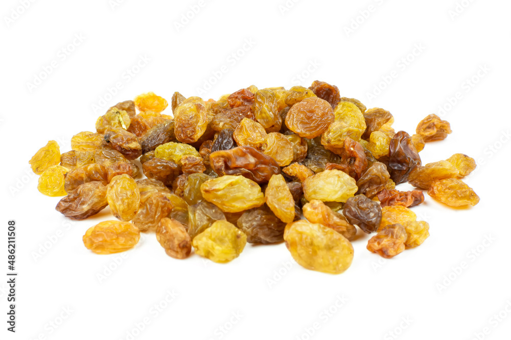 A handful of dark raisins on a white isolated background. A handful of dark raisins on a white isolated background.