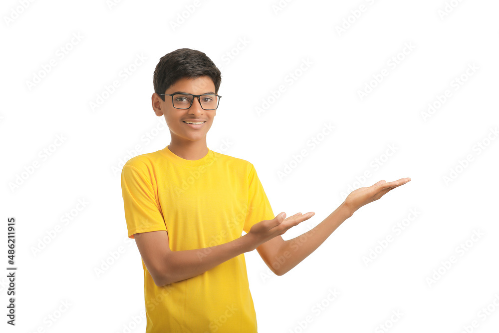 Indian child giving expression on white background. Indian child giving expression on white background.