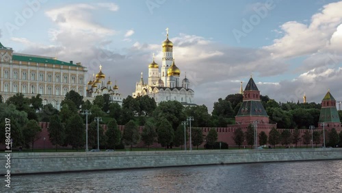 The Ivan Great Bell Tower in the Moscow Kremlin view from Moscow river with cloudy sky. Time-lapse.