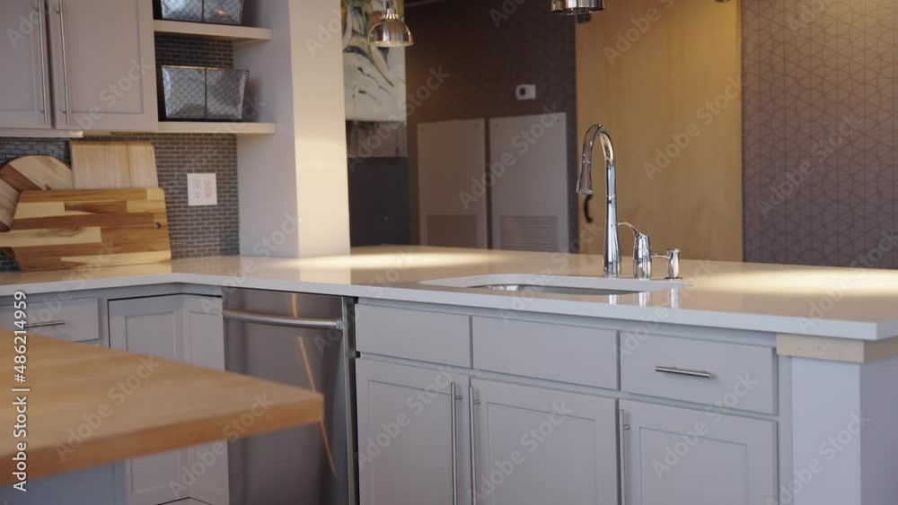 Sink Faucet in a Modern Kitchen in a Downtown Condo Building in Minneapolis Sink Faucet in a Modern Kitchen in a Downtown Condo Building in Minneapolis