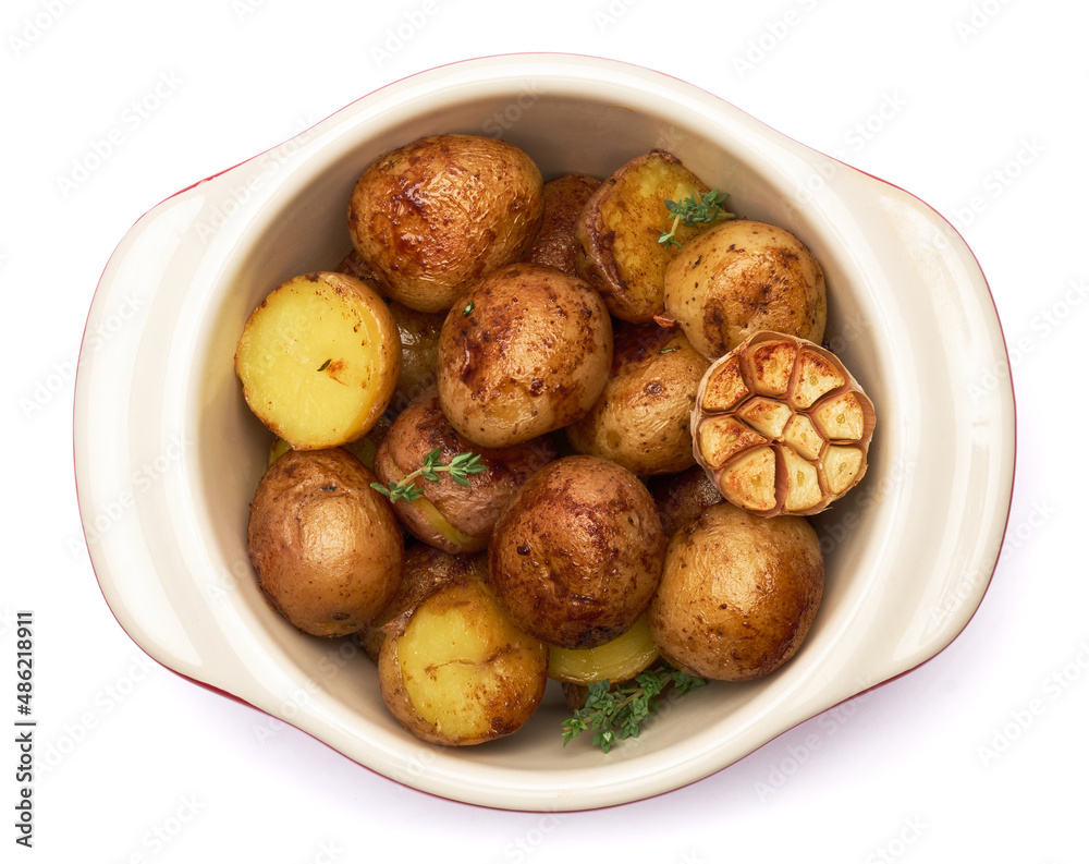 Baked potato in a clay pot isolated on white background Baked potato in a clay pot isolated on white background