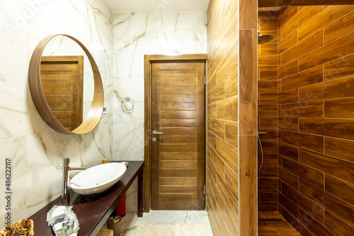 Interior of a brown tiled bathroom