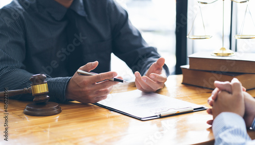 Businessman and lawyer discuss the contract document. Treaty of the law. Sign a contract business. lawyer concept.