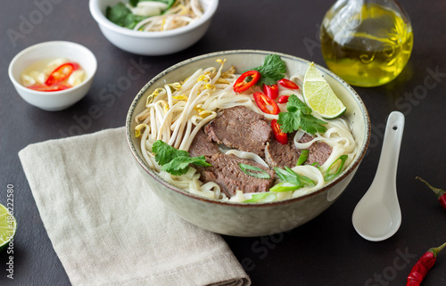 Pho Bo vietnamese soup with beef. Asian food. National cuisine. photo