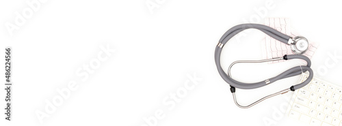 Flatlay arrangement. Stethoscope isolated on white background. Place to copy paste.