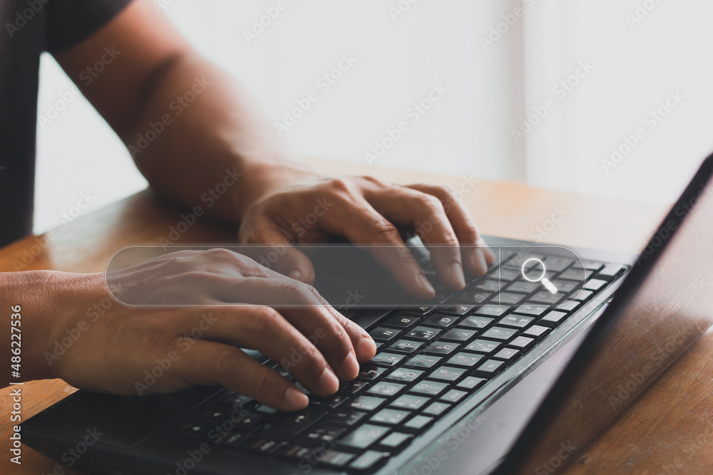 Men use notebook to search and find what they are interested in. Search Technology, Search Engine Optimization, Internet Network Concept Search. Men use notebook to search and find what they are interested in. Search Technology, Search Engine Optimization, Internet Network Concept Search.