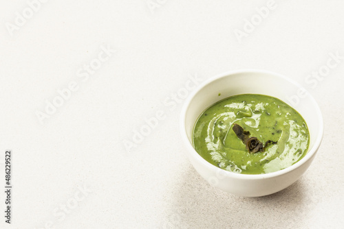 Kelp puree isolated on white background. Healthy superfood from oceanic seaweed