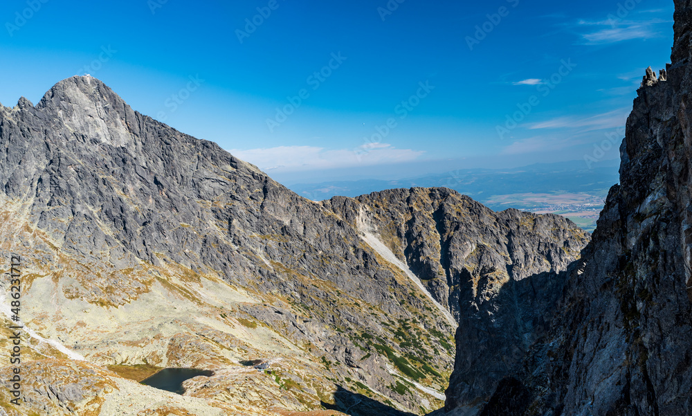 Mala Studena dolina with Teryho chata and Lomnicky stit mountain peak above from Priiecne sedlo in Vysoke Tatry mountains in Slovakia Mala Studena dolina with Teryho chata and Lomnicky stit mountain peak above from Priiecne sedlo in Vysoke Tatry mountains in Slovakia