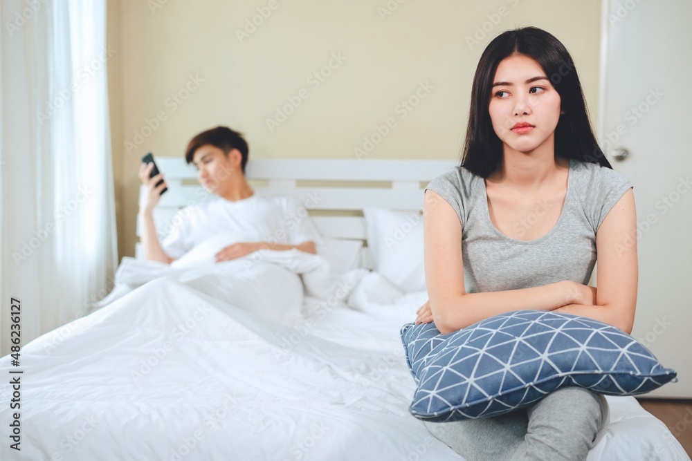 unhappy young asian couple have problems in relationships. unhappy young asian couple have problems in relationships.