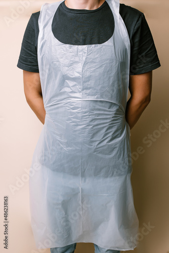 Fotografia Plastic apron on male body Eco concept