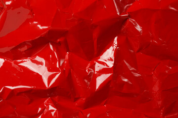 Elegant dark red background, red latex or leather
