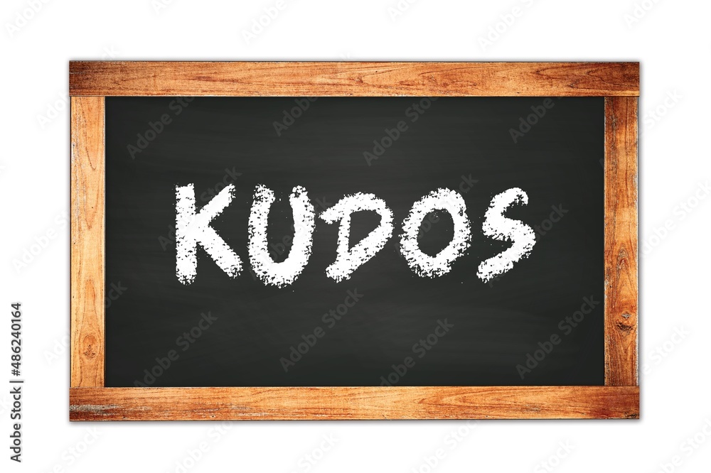 KUDOS text written on wooden frame school blackboard. KUDOS text written on wooden frame school blackboard.