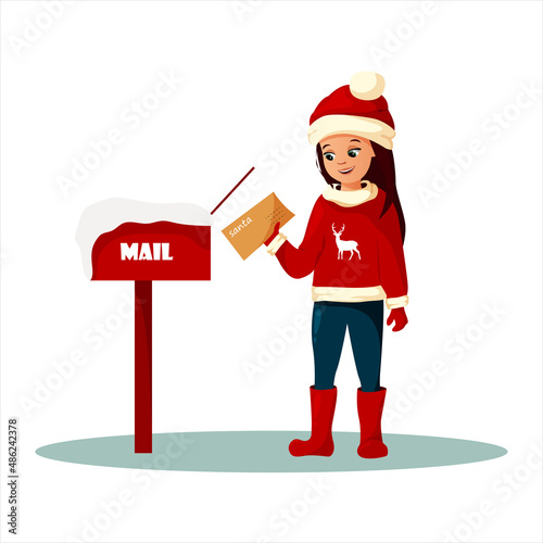 Little girl with a letter for santa near the mailbox