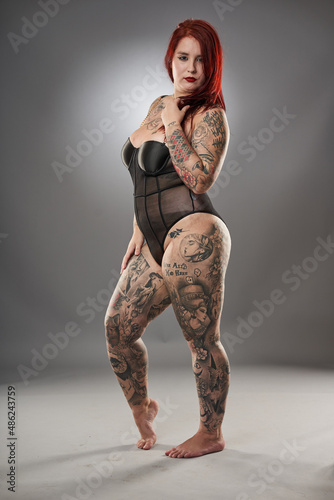 Glamour plus size model with tattoos photo