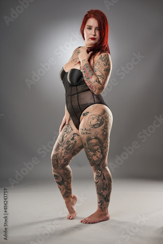 Photos Glamour plus size model with tattoos