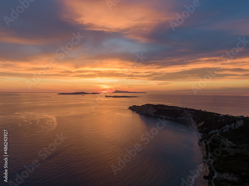 Spectacular Aerial drone view of sunset in arillas beach in corfu greece