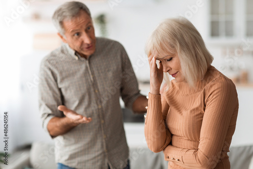 Aggressive Senior Husband Shouting At Wife Having Quarrel At Home