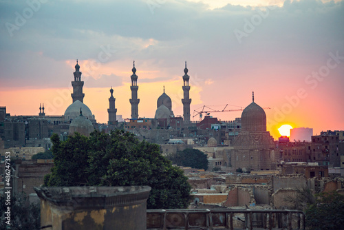 Old Cairo skyline at sunset, view of old and Coptic Cairo from the bridge, Egypt