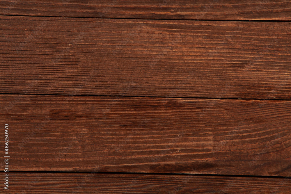 Fototapeta premium Painted wooden board for design or text. Colored wood abstraction.