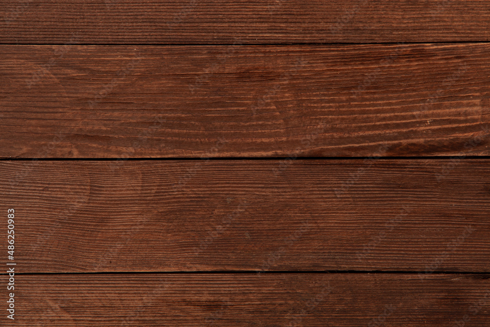 Fototapeta premium Painted wooden board for design or text. Colored wood abstraction.