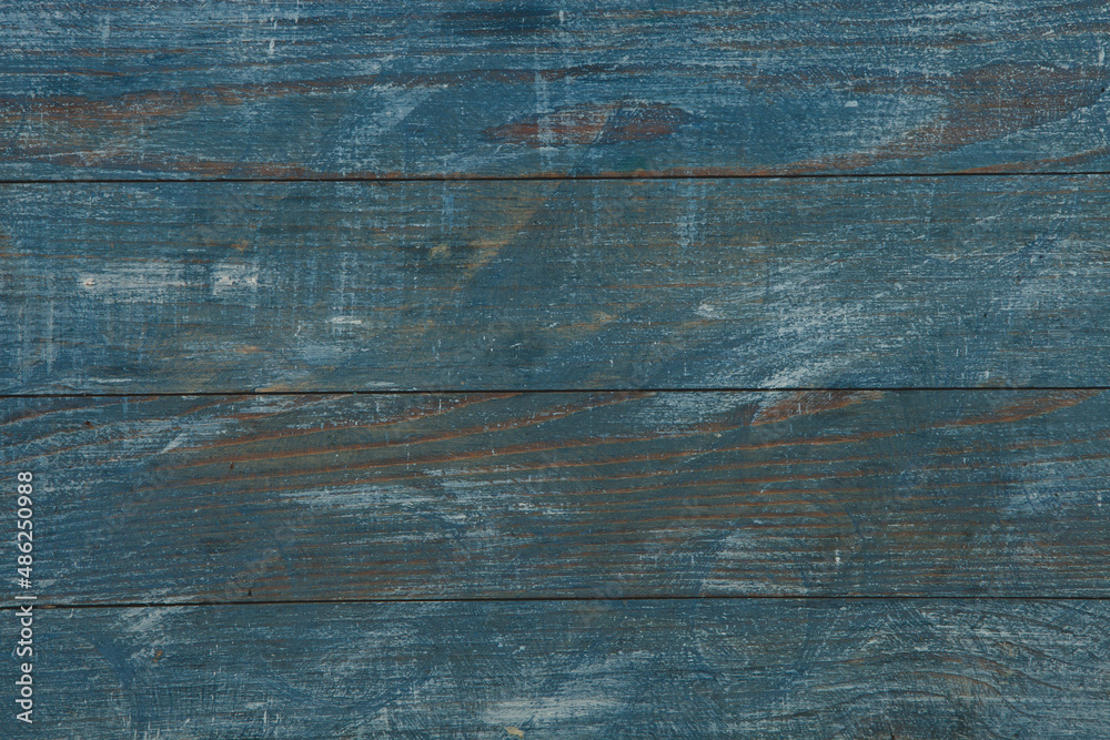 Naklejka premium Painted wooden board for design or text. Colored wood abstraction.