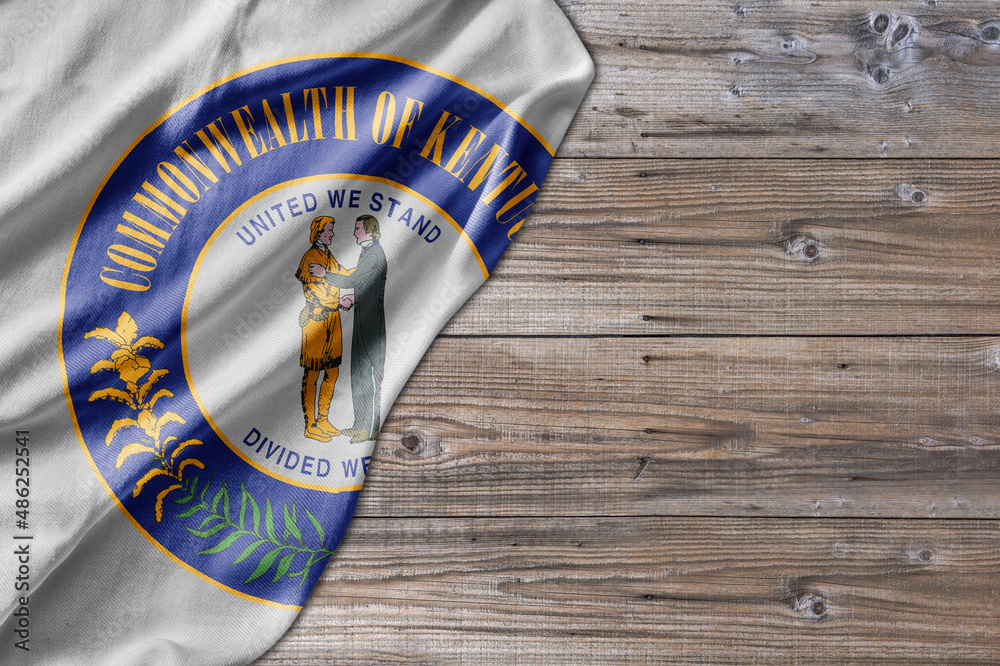 Φωτογραφία United States country state Kentucky Seal on old wooden pattern table board