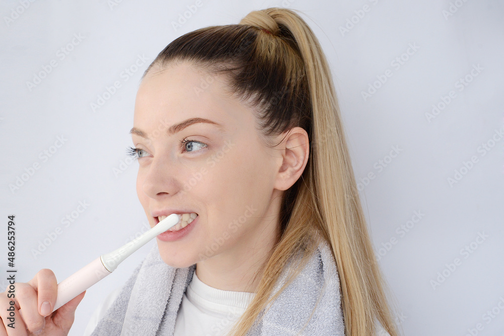 pretty woman brushing her teeth pretty woman brushing her teeth