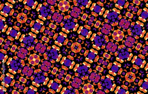 Abstract kaleidoscope background. Beautiful multicolor kaleidoscope texture. Unique kaleidoscope design in red and orange colors on a black background.