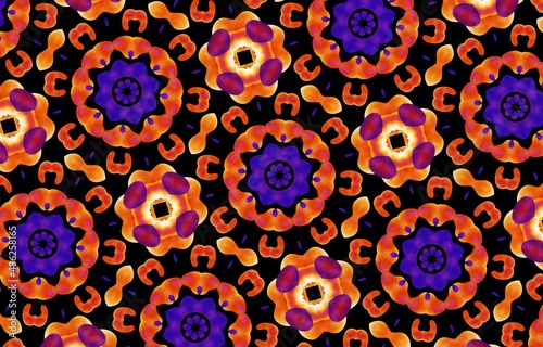 Abstract kaleidoscope background. Beautiful multicolor kaleidoscope texture. Unique kaleidoscope design in red and orange colors on a black background.