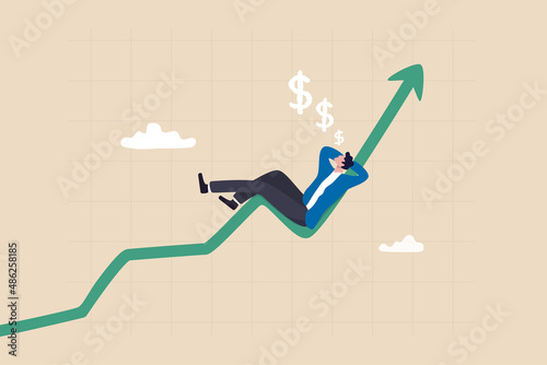 Success investment earn more profit or easy growing return mutual fund, make money from cryptocurrency trading or dream about being rich concept, businessman investor relax and sleep on growing graph. photo