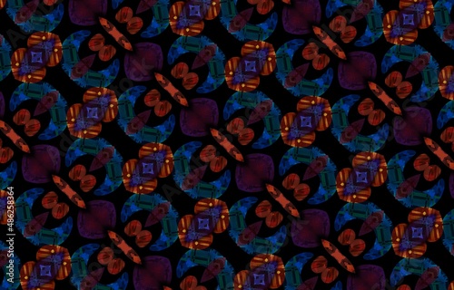 Abstract kaleidoscope background. Beautiful multicolor kaleidoscope texture. Unique kaleidoscope design in red and orange colors on a black background.