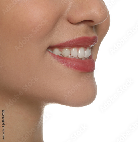 Happy young woman with healthy teeth on white background  closeup