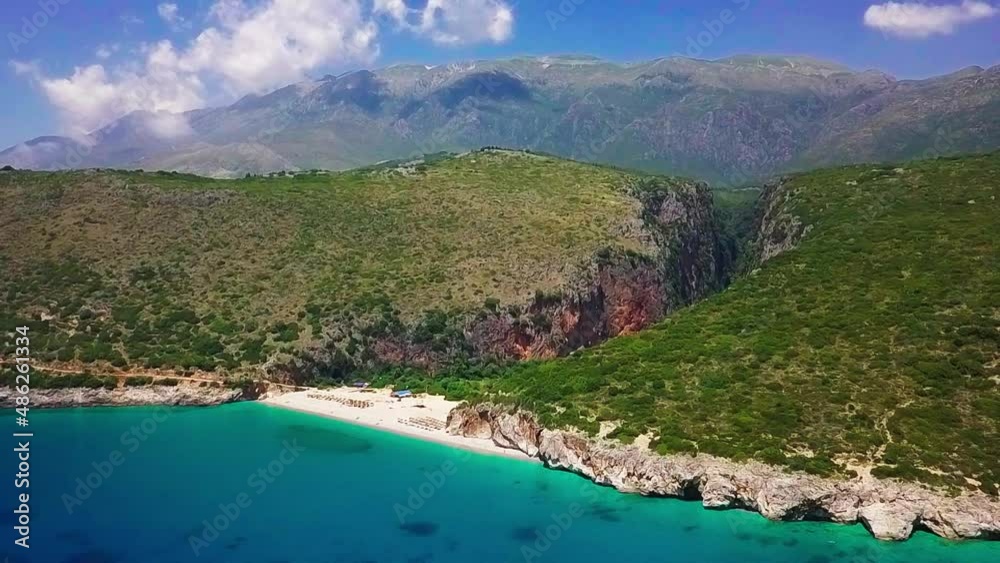 Beautiful coastline and canyon at Gjipe Beach in Southern Albania in the Riviera. Aerial pull back Beautiful coastline and canyon at Gjipe Beach in Southern Albania in the Riviera. Aerial pull back