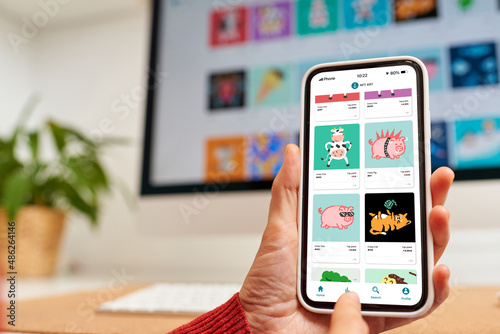Close up of an NFT marketplace on a mobile phone