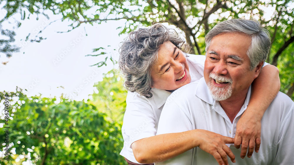 relationship elderly couple health care in park, retirement old adult man and woman embracing in love hug and smile, People retirement lifestyle concept. relationship elderly couple health care in park, retirement old adult man and woman embracing in love hug and smile, People retirement lifestyle concept.