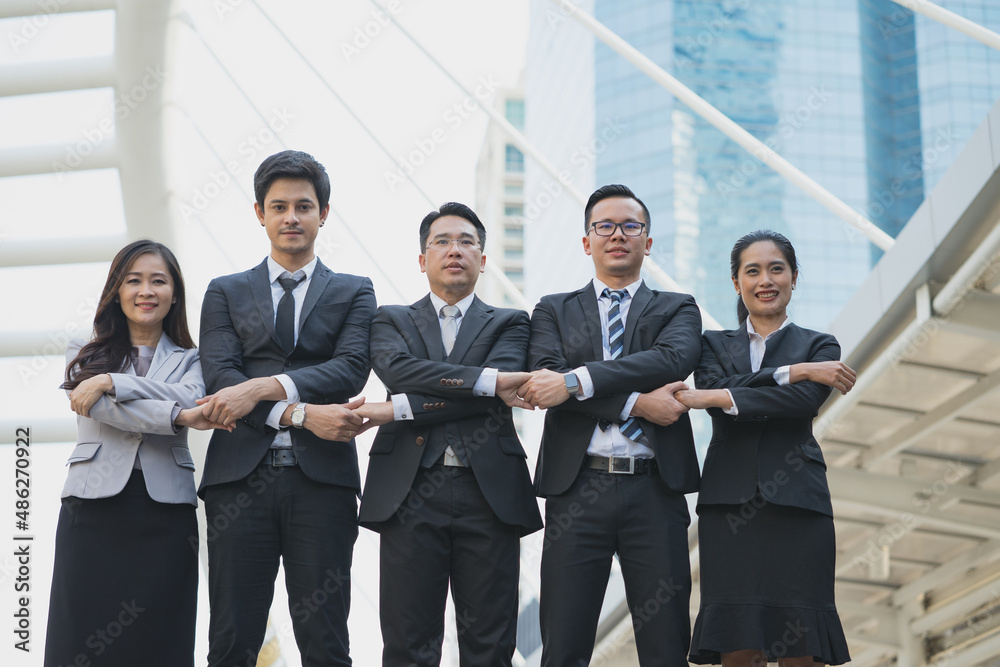 victory business team showing hands up, Successful business people working together joyful victory. victory business team showing hands up, Successful business people working together joyful victory.