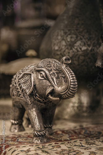 Elephant figurine made of metal. Detailed close-up elephant figurine made of metal. National souvenir. Jordanian souvenir shop.