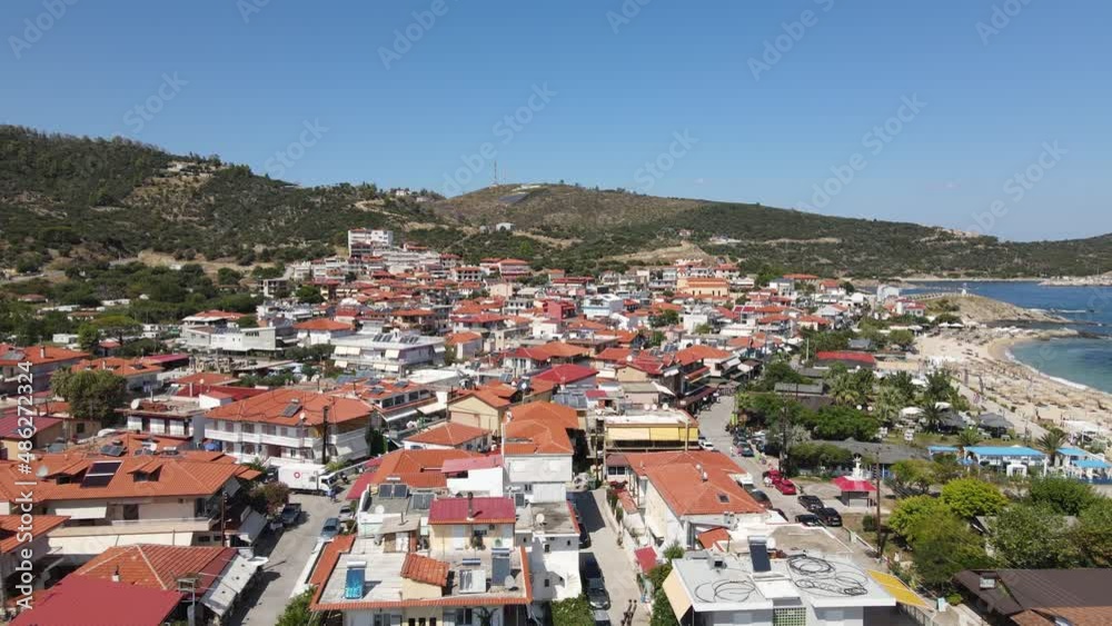 Aerial View of Sarti, Chalkidiki Greece. Buildings in Small Touristic Town by the Sea on Sunny Summer Day Aerial View of Sarti, Chalkidiki Greece. Buildings in Small Touristic Town by the Sea on Sunny Summer Day