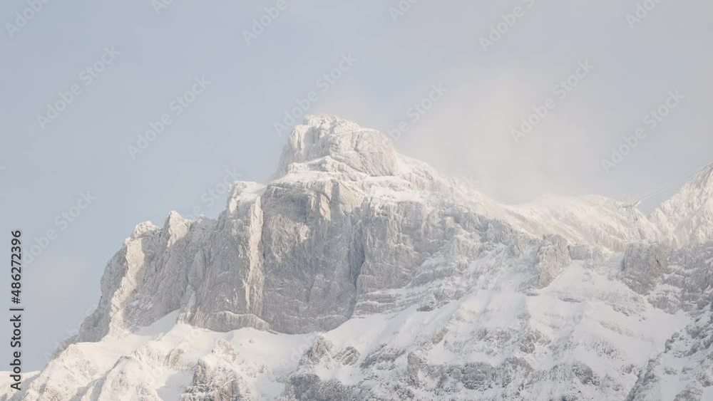 custom made wallpaper toronto digitalSwiss Mountain Saentis in the alps with fresh snow and fog. Beautiful snowy mountains and trees. Weather station on top of the mountain.