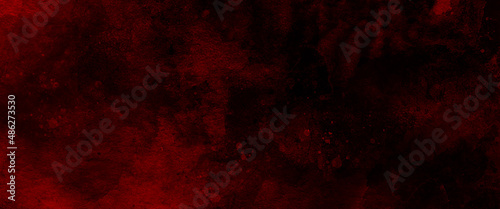 Rich red background texture, marbled stone or rock textured banner with elegant holiday color and design with mottled leave pattern painted in grunge texture design. 