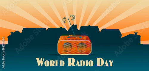 Banner or poster for world radio day with retro cassette stereo system on city background with concept lettering